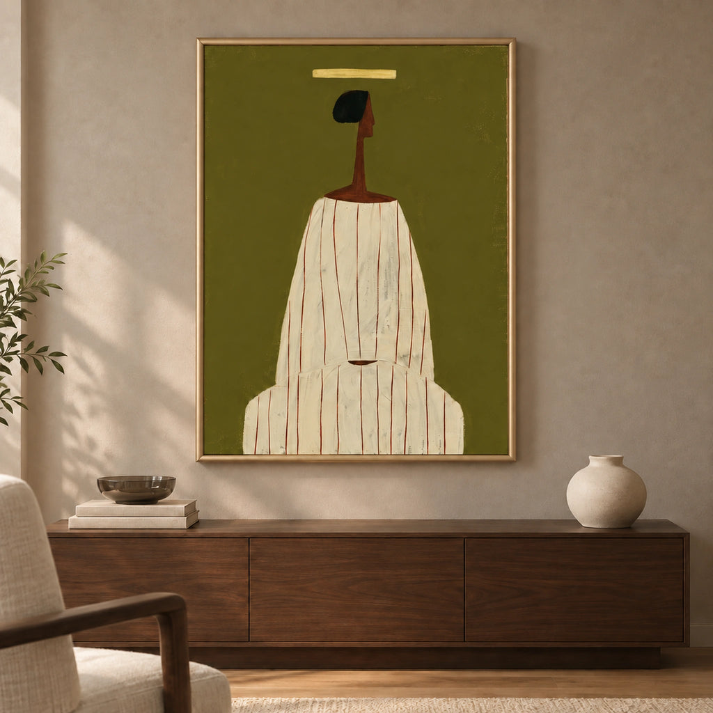 The Olive Muse in a thin satin-gold wooden frame above a walnut sideboard, featuring a cream-robed figure on olive green.