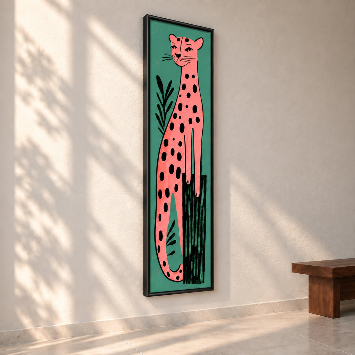 Angled view of Pink Leopard on Teal wall art showing the slim black wooden frame and its rounded satin profile.
