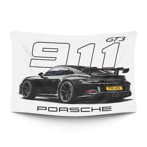 Black Porsche 911 silhouette against a warm dusk glow — LoudBorders wall tapestry.