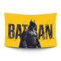 Robert Pattinson’s Batman silhouette in rain-streaked red light over a dark Gotham backdrop — LoudBorders wall tapestry.