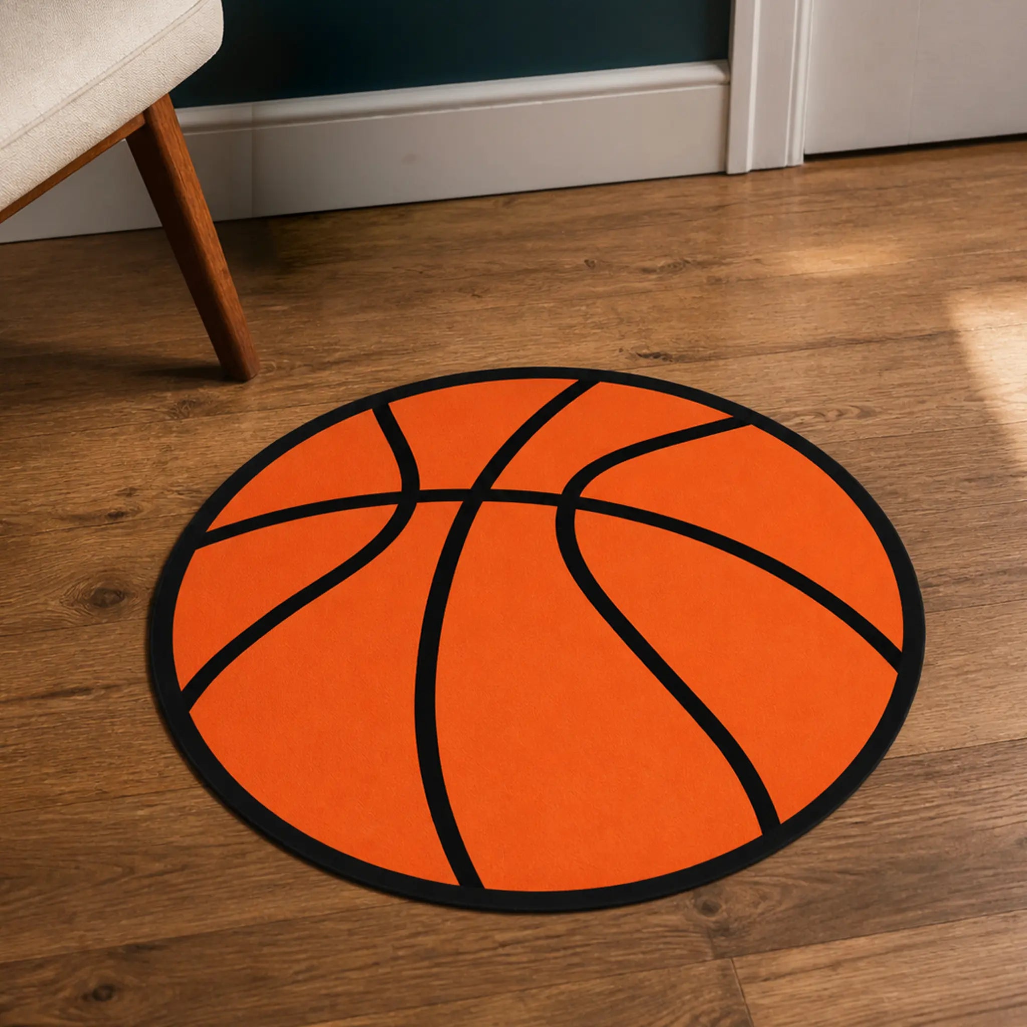 Basketball Mode die-cut rug — classic orange basketball with black seam lines, cut to the circle with black edge binding