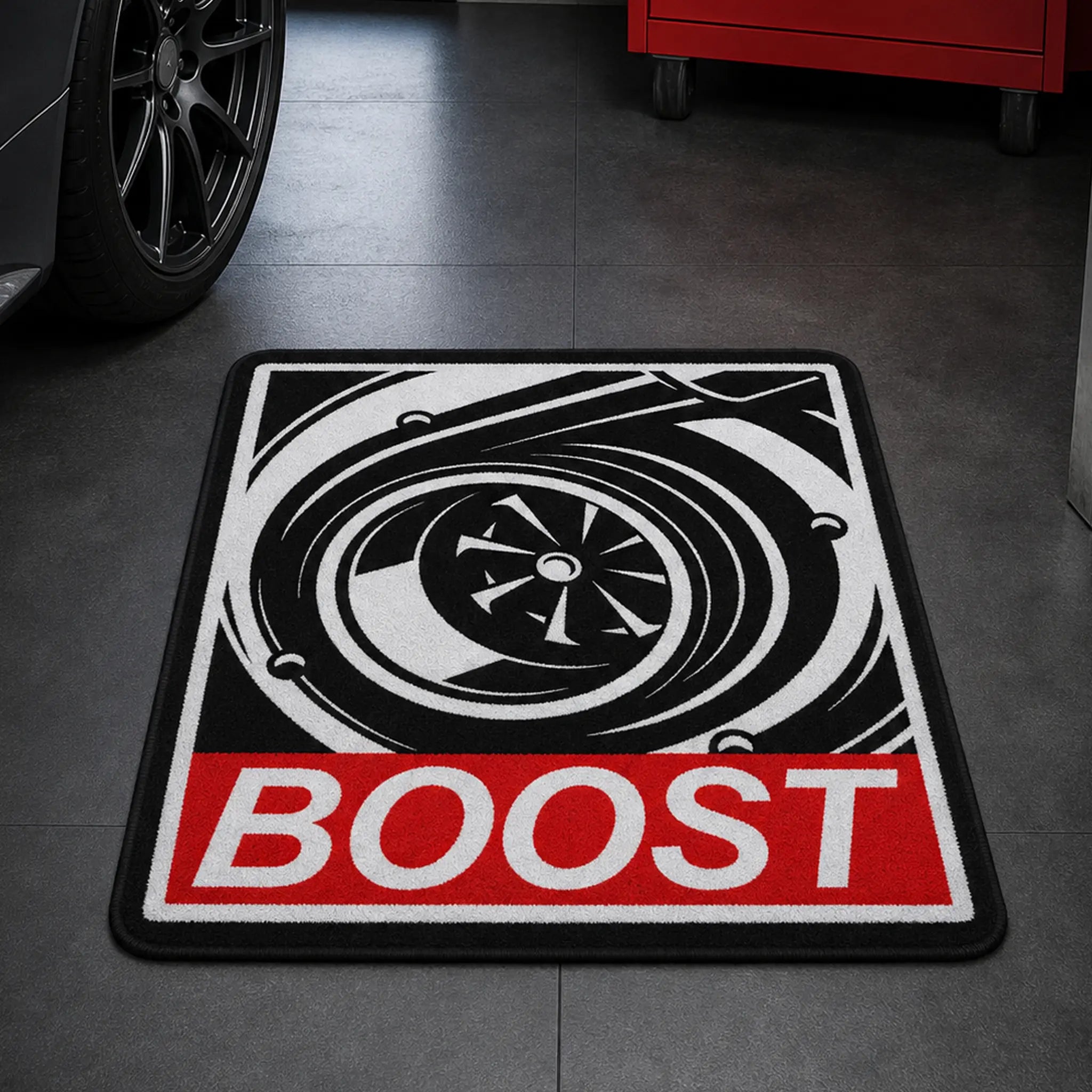 Boost Mode die-cut rug — black-and-white turbocharger illustration with BOOST in a red bar, cut to the framed poster shape with black edge binding