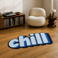 CHILL Mode die-cut rug — the word chill in soft blue retro 3D lettering with a stacked shadow, cut to the word shape with black edge binding