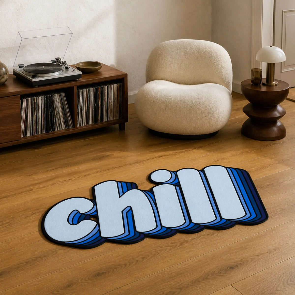 CHILL Mode die-cut rug — the word chill in soft blue retro 3D lettering with a stacked shadow, cut to the word shape with black edge binding