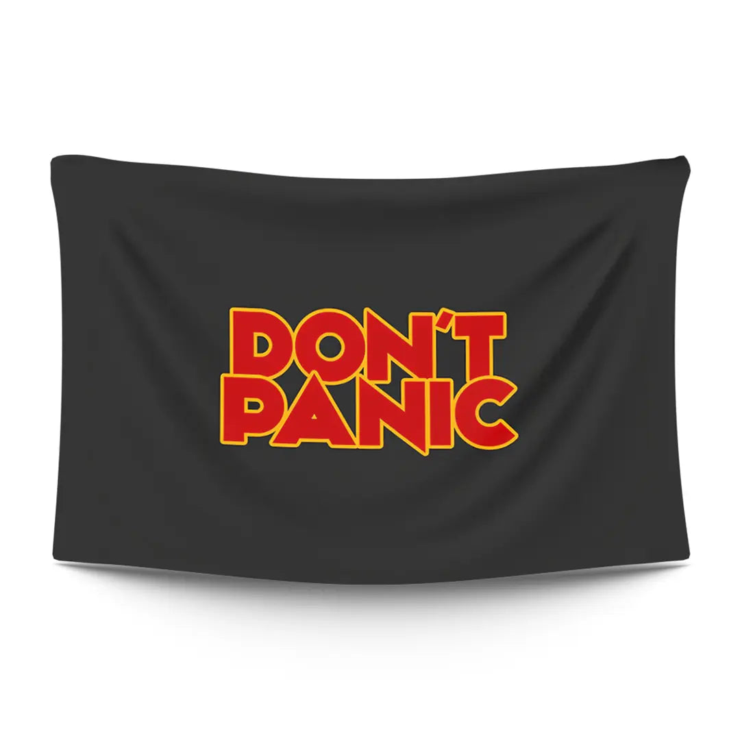 Bold ‘DON’T PANIC’ in big friendly letters on a moody dark backdrop — LoudBorders wall tapestry.