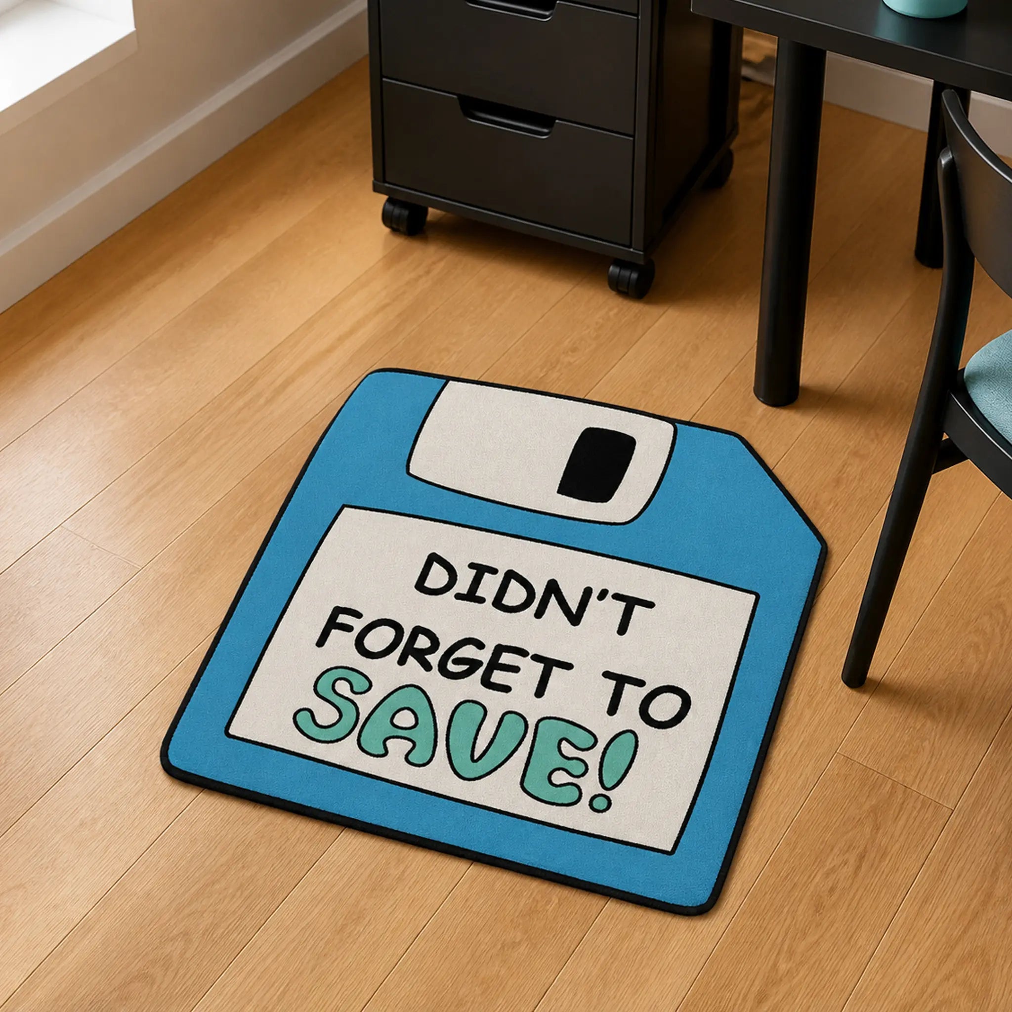 Don’t Forget To Save die-cut rug — blue floppy disk with DIDN’T FORGET TO SAVE! on the label, cut to the disk shape with black edge binding