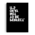 INVERTED PERFECTION — Bold white type on a deep black field reads "IT'S OKAY NOT TO BE PERFECT", framed wall art poster