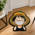 Straw Hat Smile die-cut rug — anime character in a straw hat with a wide grin and scar under the eye, cut to the character shape with black edge binding