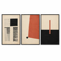 Terra Form set of three black-framed abstract prints with black brushwork, terracotta shapes and ivory backgrounds, shown side by side on white.