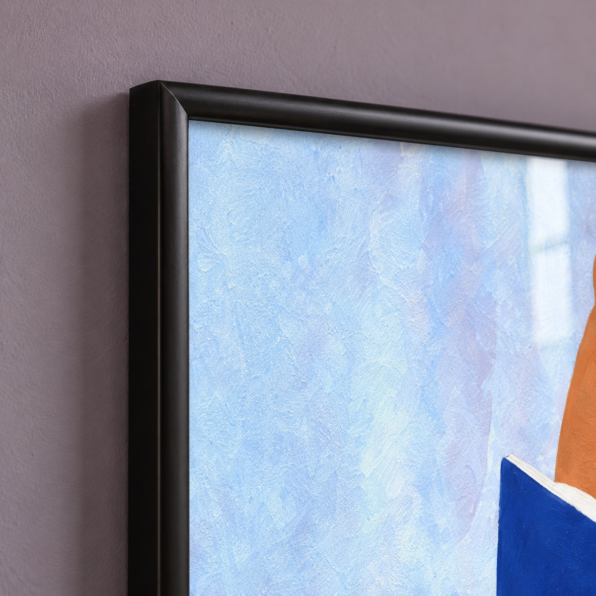 Top-left frame detail of The Sunday Chapter, showing the mitred corner, rounded satin-black profile and pale blue artwork behind reflective glass.