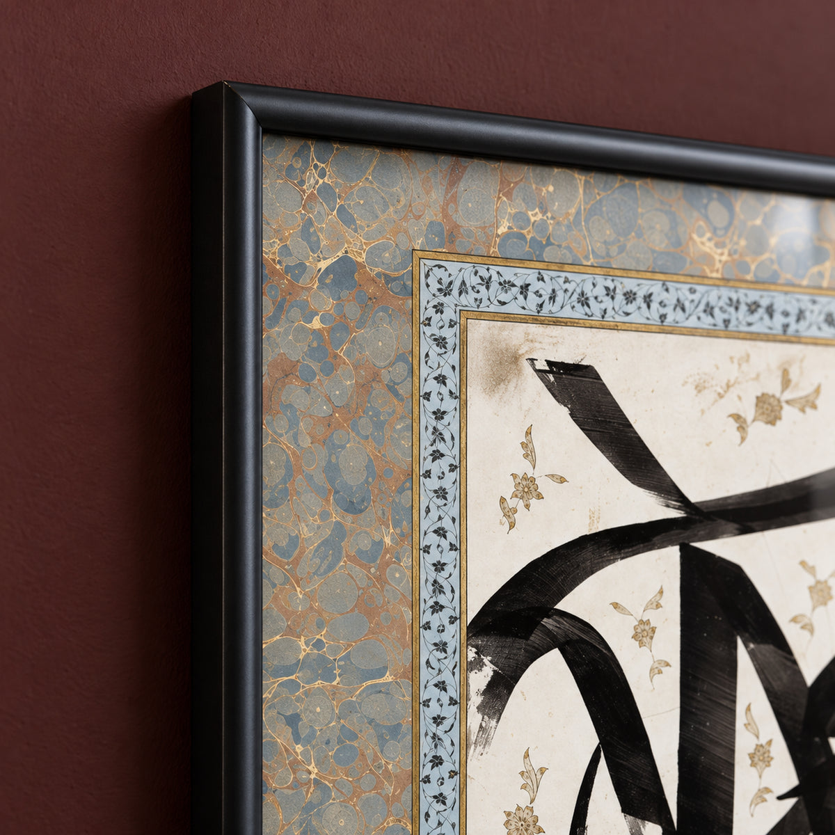 Top-left frame detail of Ink & Ivory, showing the mitred corner, rounded satin-black profile and blue-grey border with gold-toned marbling.