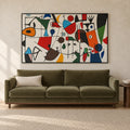 Front view of Chromatic Play, colourful modernist abstract wall art in a thin black frame above an olive sofa against a warm plaster wall.