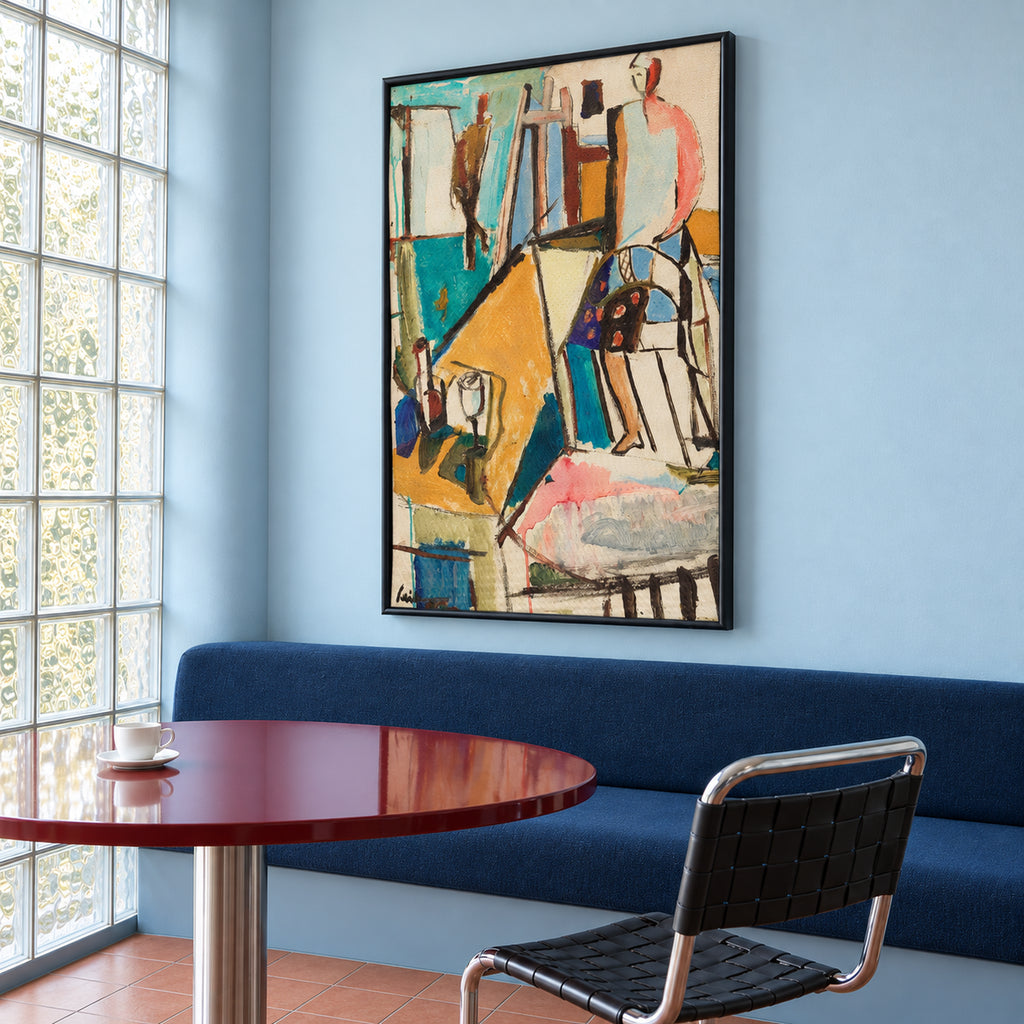 Angled view of Studio Reverie showing the complete portrait-format studio scene and the depth of its slim black frame beside a glass-block window.