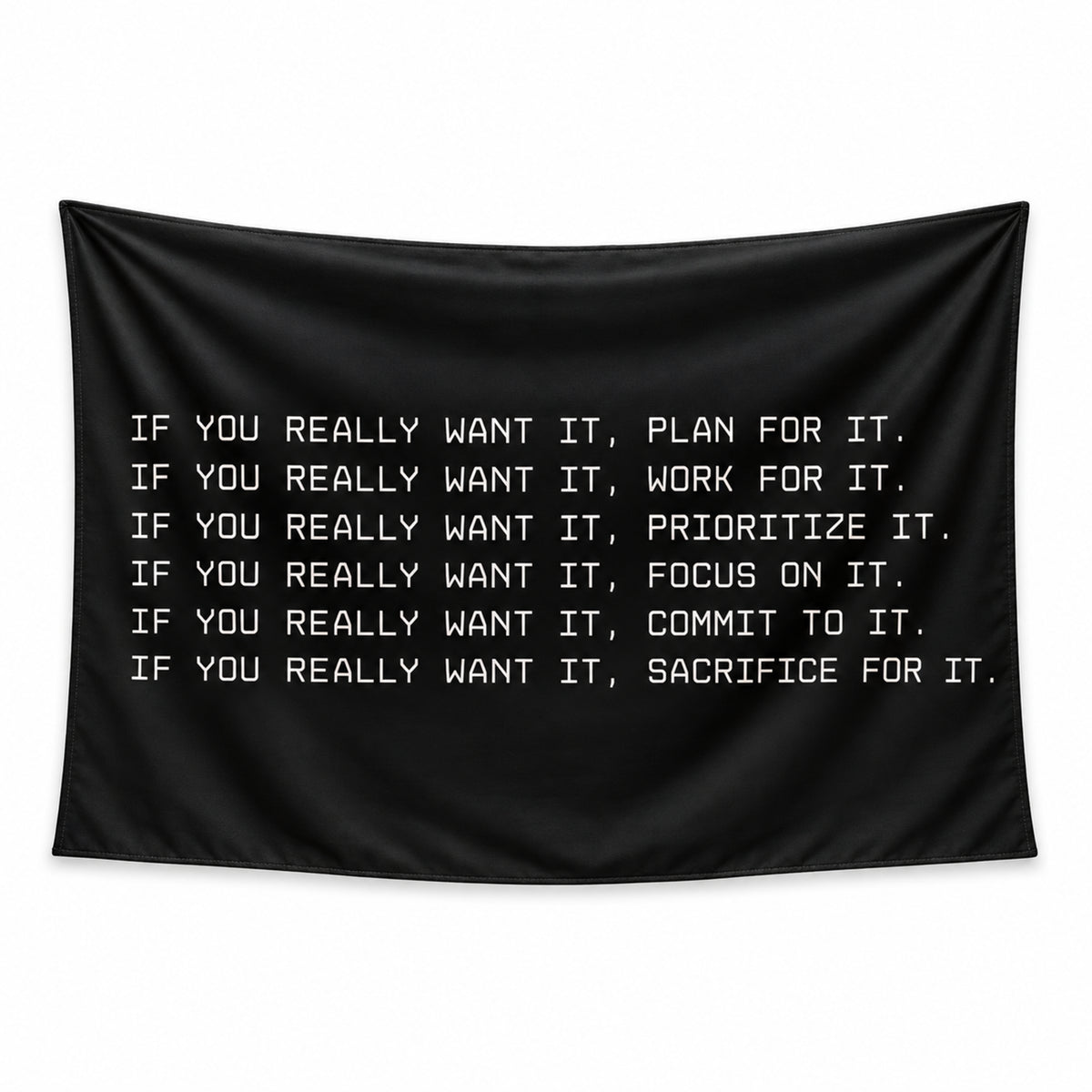 Earn It wall tapestry with six lines of white motivational text beginning IF YOU REALLY WANT IT on a black background.