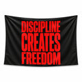 Black Discipline Creates Freedom wall tapestry with tall red lettering.