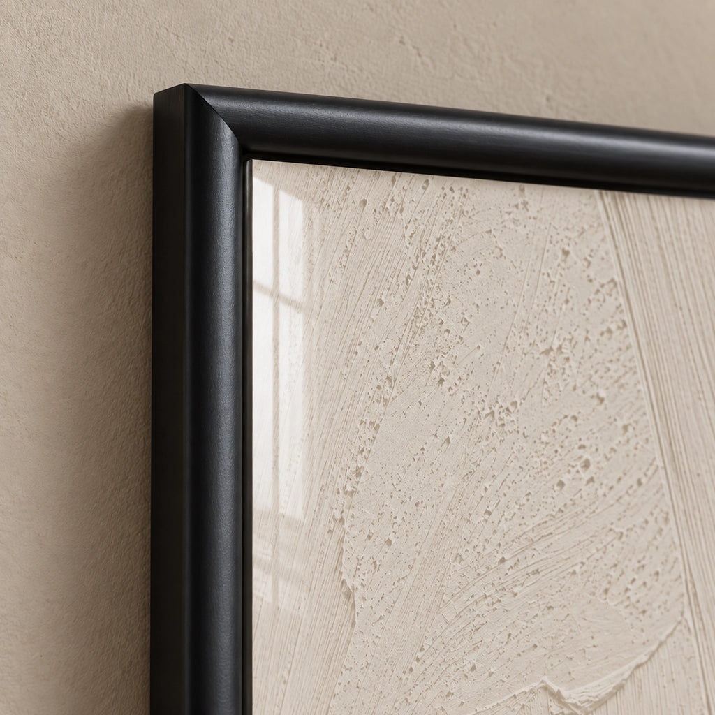 Quiet Dialogue frame detail showing the black molding, mitred corner and glass over the ivory print's textured design.