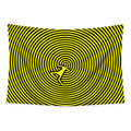 Spiral Escape wall tapestry with electric-yellow and black spiral rings and a small angular figure crossing the center.