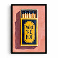 Strike a Spark artwork showing an open navy-and-yellow matchbox labelled YOU’RE HOT on a warm pink background.