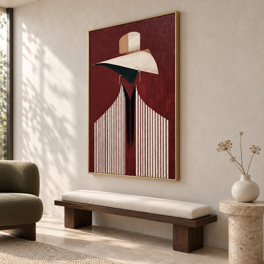 Angled view of The Burgundy Muse, showing the complete portrait behind glass, the slim satin-gold frame and its side profile.