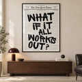 Front view of The Optimist’s Edition newspaper quote print in a thin black frame with glass, above a walnut credenza with a burgundy lamp.