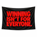 Winning Mindset wall tapestry with WINNING ISN'T FOR EVERYONE in oversized red lettering on a black background.